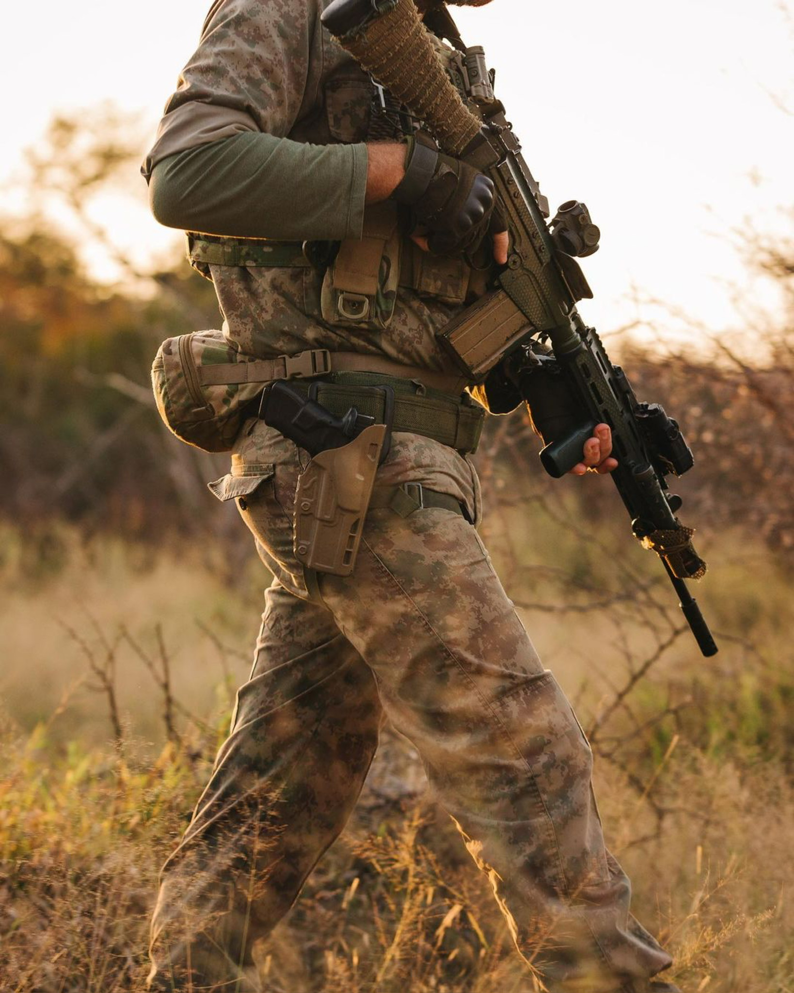 Eco Defense Group operator on anti-poaching patrol at golden hour